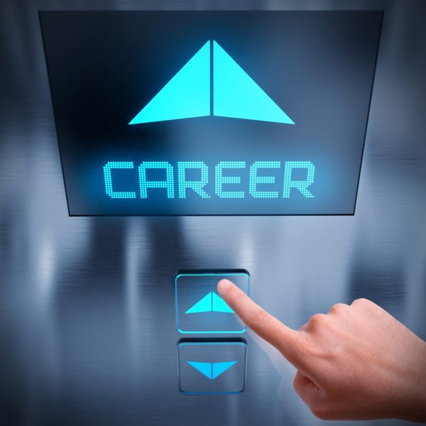 Finger pushing up button on career elevator